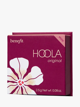 Benefit Hoola beside lipstick demonstrating compact scale and portability