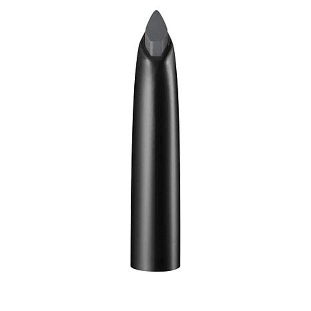 Benefit spoolie brushing brows to blend color and shape for polished finish