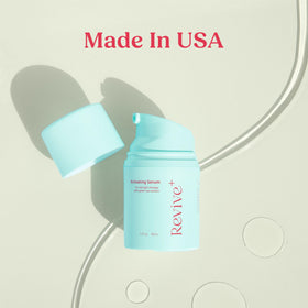 Berkland bottle beside a hand for scale showing compact 1 oz travel-friendly size