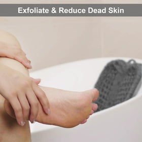 BESKAR mat in shower while user stands cleaning feet hands-free