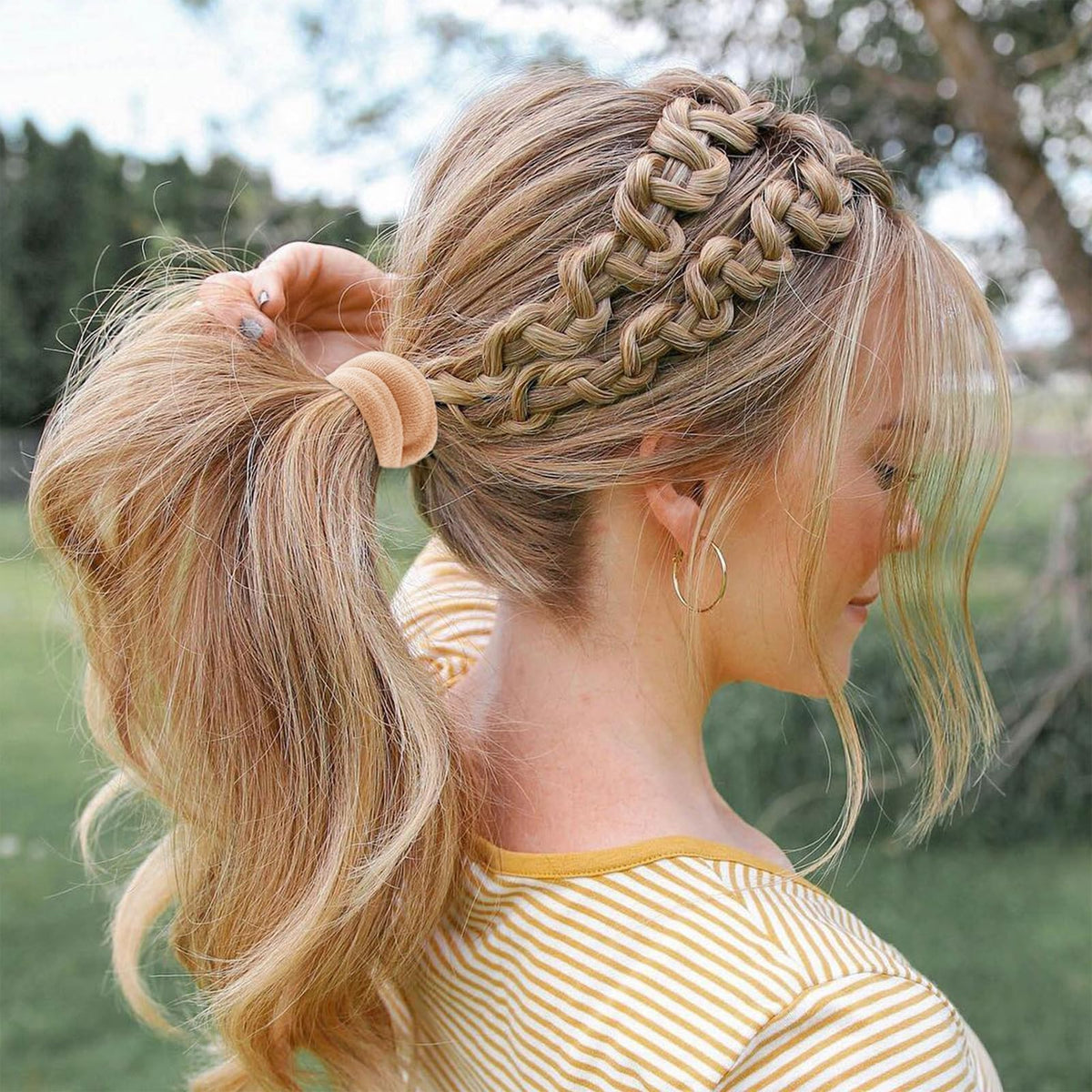 Bessrung hair tie securing a thick ponytail demonstrating strong hold without damage