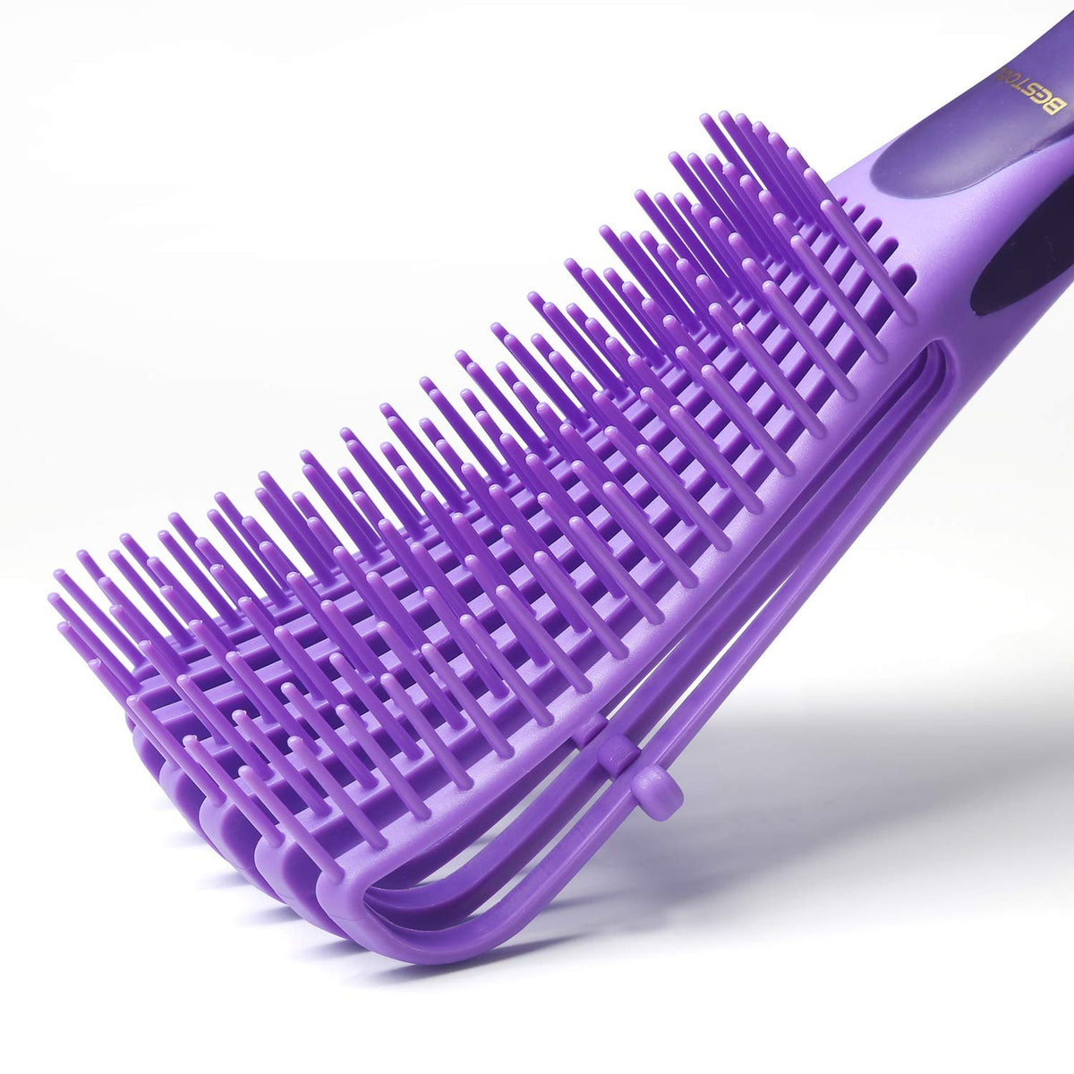 BESTOOL detangler in hand illustrating size and travel-friendly portability benefit