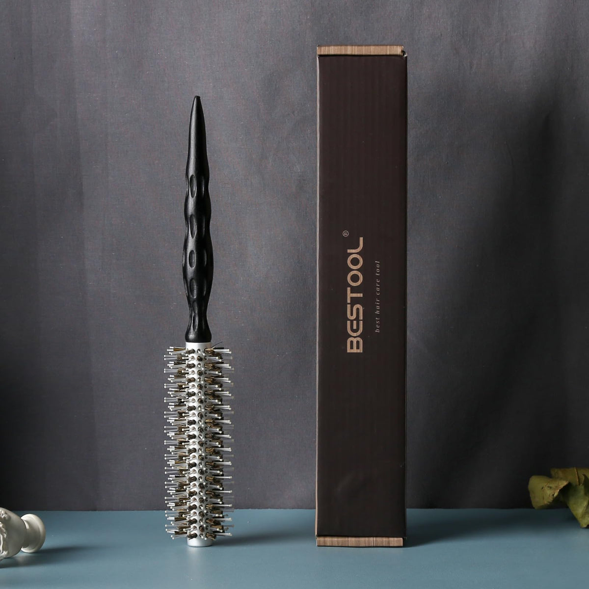 BESTOOL in-use styling image creating volume and smooth blowout at roots