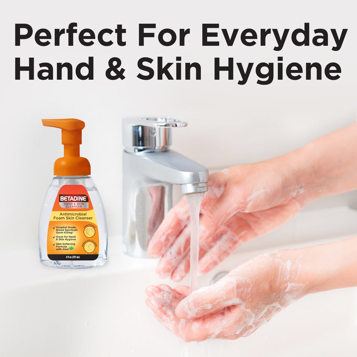 Betadine bottle beside hand to show 8oz portable size advantage