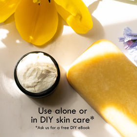 Better Shea Butter cocoa butter melting on hand demonstrating easy absorption and hydration