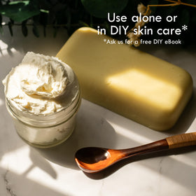 Better Shea Butter melting between palms demonstrating quick absorption and moisturizing effect