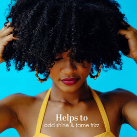 Better Shea Butter scooped from block highlighting smooth consistency for DIY use benefit