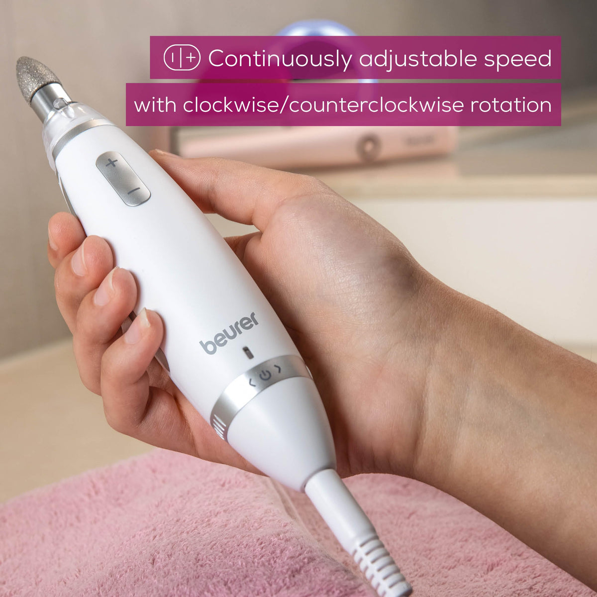 Beurer handpiece close-up highlighting ergonomic grip and precise control