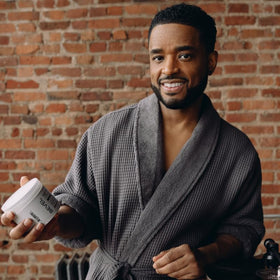 Lifestyle bathroom scene with Bevel cream for an elevated grooming routine