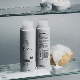Bevel 16 oz bottle beside common objects for scale, clarifies size and value