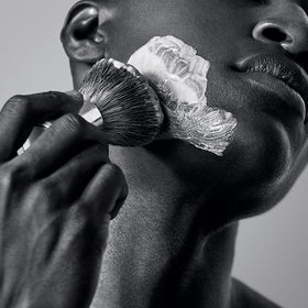 Bevel kit next to razor to show product scale and travel-ready convenience
