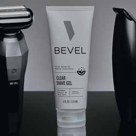 Bevel 4 fl oz size scale next to ruler for travel-friendly convenience
