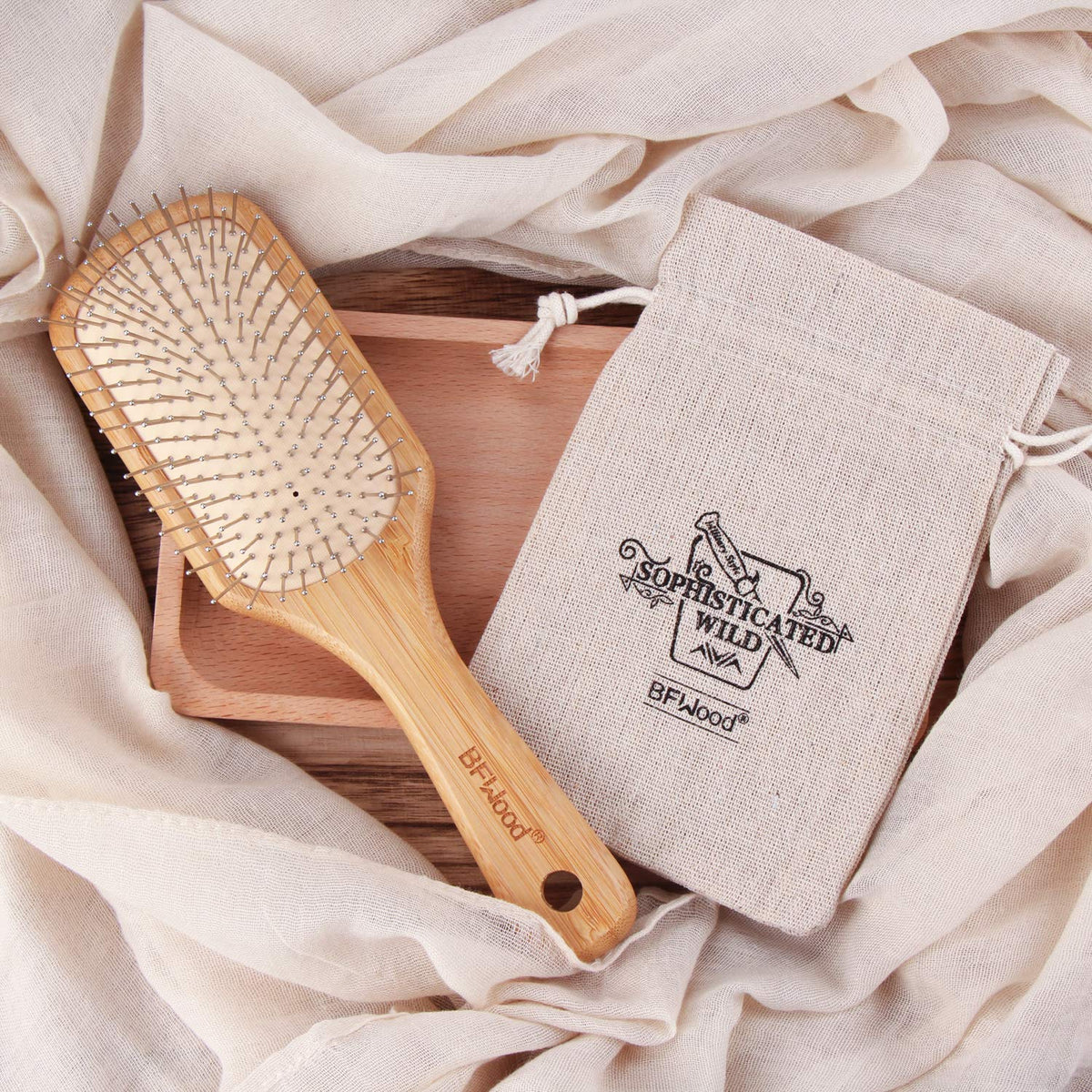 BFWood brush next to ruler for scale, compact travel-friendly benefit