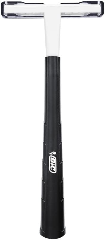 BIC razor next to ruler for scale showing compact size and travel-friendly profile