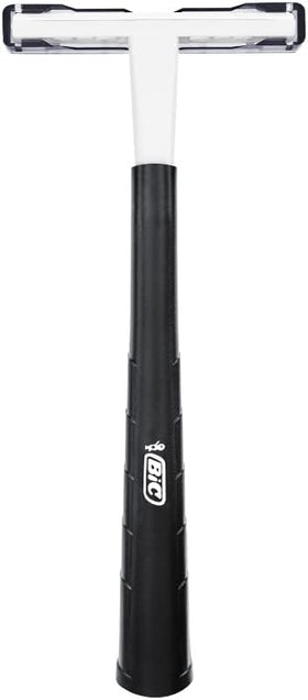 BIC razor next to ruler for scale showing compact size and travel-friendly profile