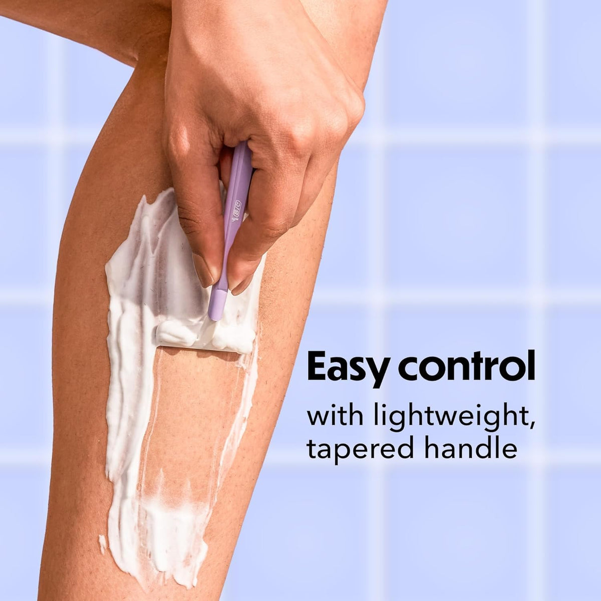 BIC Silky Touch razor on shower shelf in dorm setting for shared bathrooms
