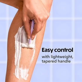 BIC Silky Touch razor on shower shelf in dorm setting for shared bathrooms