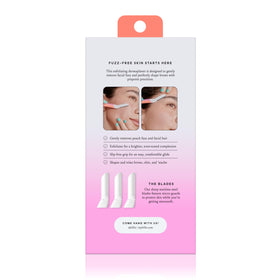 Billie dermaplane next to coin to show compact size and travel readiness