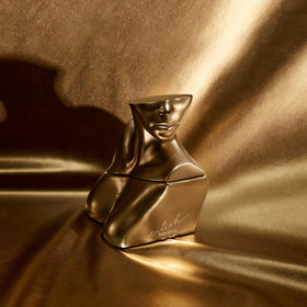 Billie Eilish gilded cap detail highlighting sculptural craftsmanship benefit