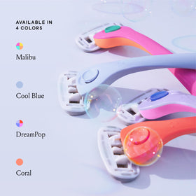Billie razor beside coin for size comparison and compact design