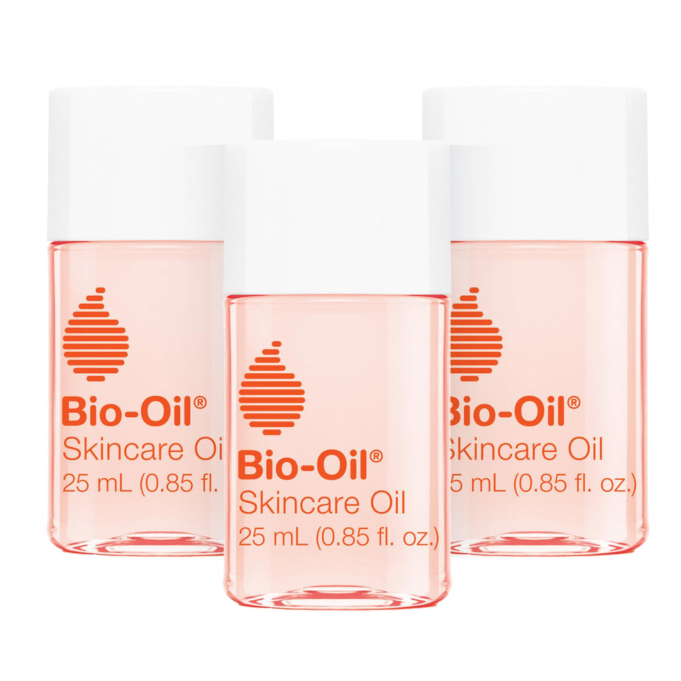 Bio-Oil front packaging showing three travel-sized bottles and clear branding for travel convenience