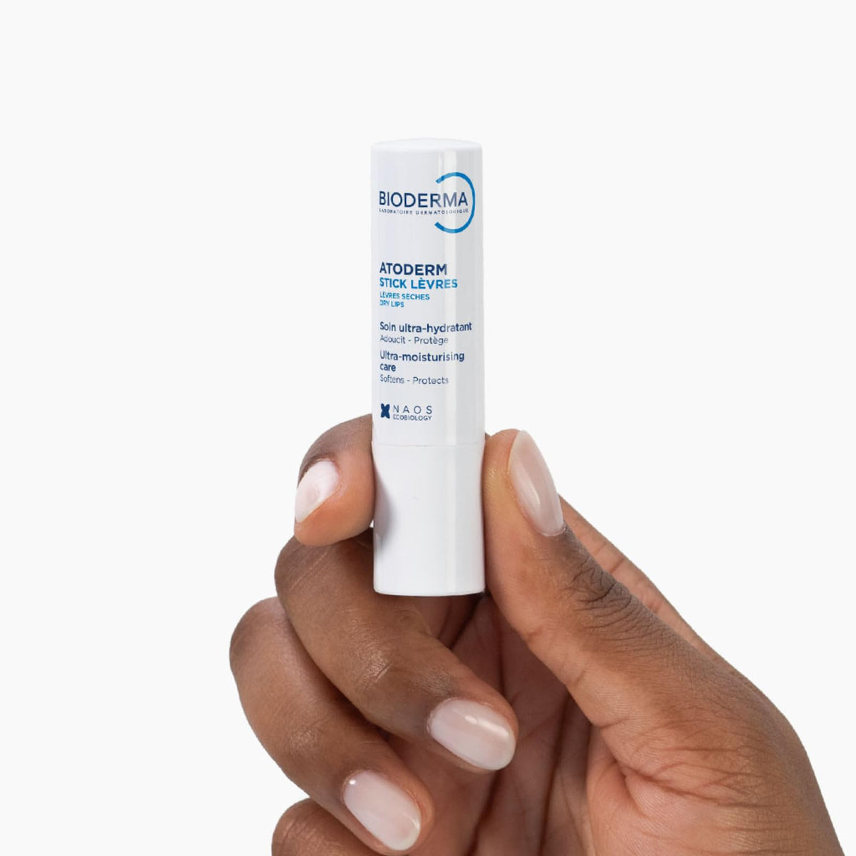 Bioderma Atoderm lip stick in outdoor setting protecting lips from wind and cold
