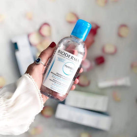 Small travel bottle refilled from Bioderma to show portability and cost-saving benefit