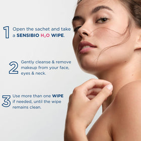 Hand holding a wipe to show size and coverage for face and eyes by Bioderma