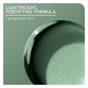Biolage serum on a bathroom shelf in lifestyle setting for daily routine appeal