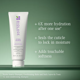 Biolage conditioner pouring to show consistency and easy spreadability
