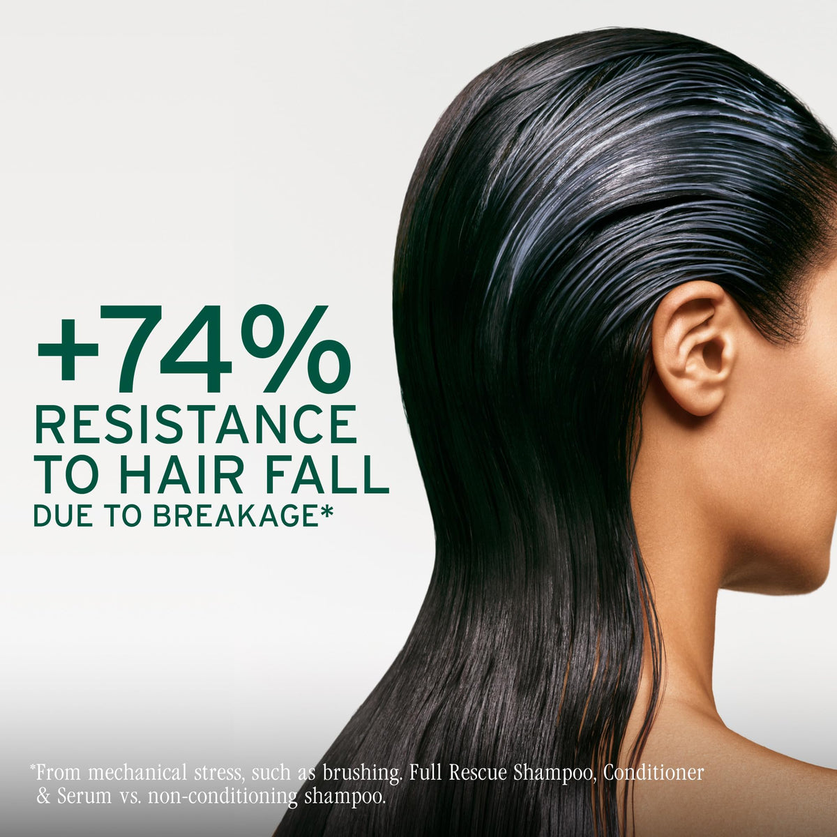 Applying Biolage at roots on damp hair for lift and fuller-looking hair benefit