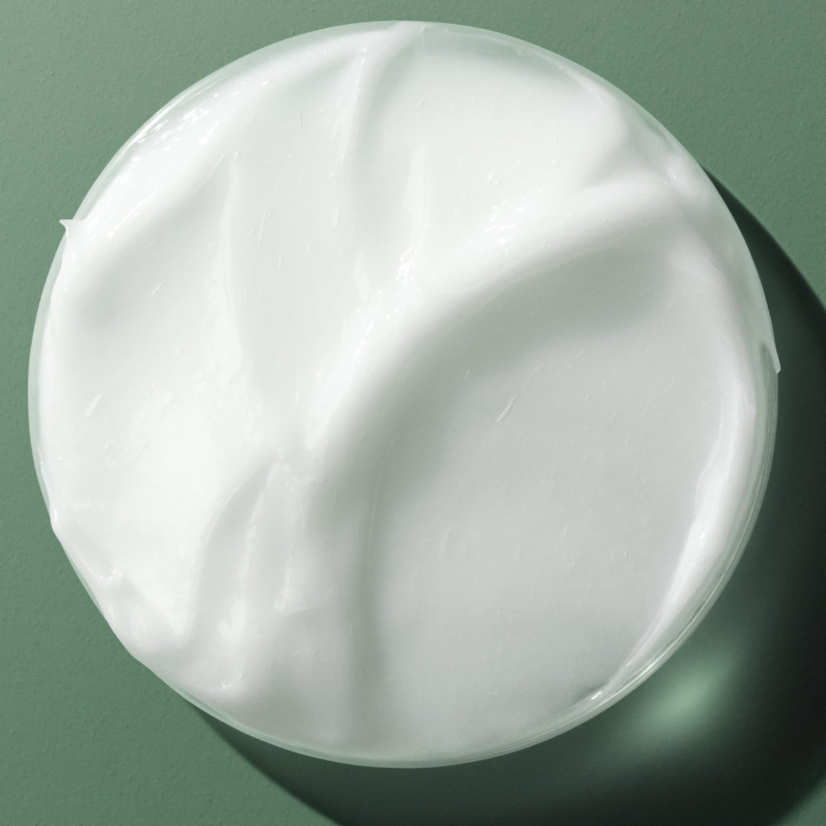 Biolage in use while blow-drying to tame frizz and deliver glossy finish