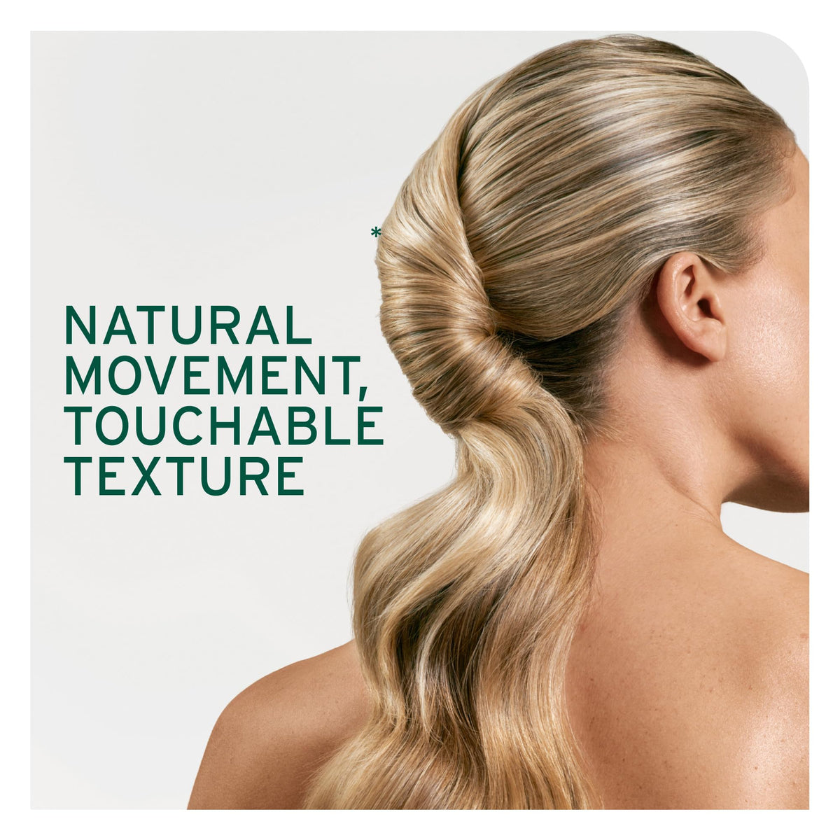 Biolage spray in use by stylist providing quick-dry finish