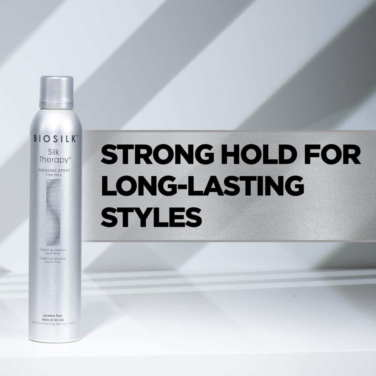 Close-up of glossy hair after BioSilk spray showing enhanced shine and smoothness