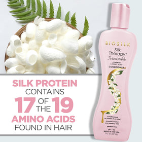 BioSilk bottle next to hand for size comparison showing convenient 7 oz travel-friendly benefit