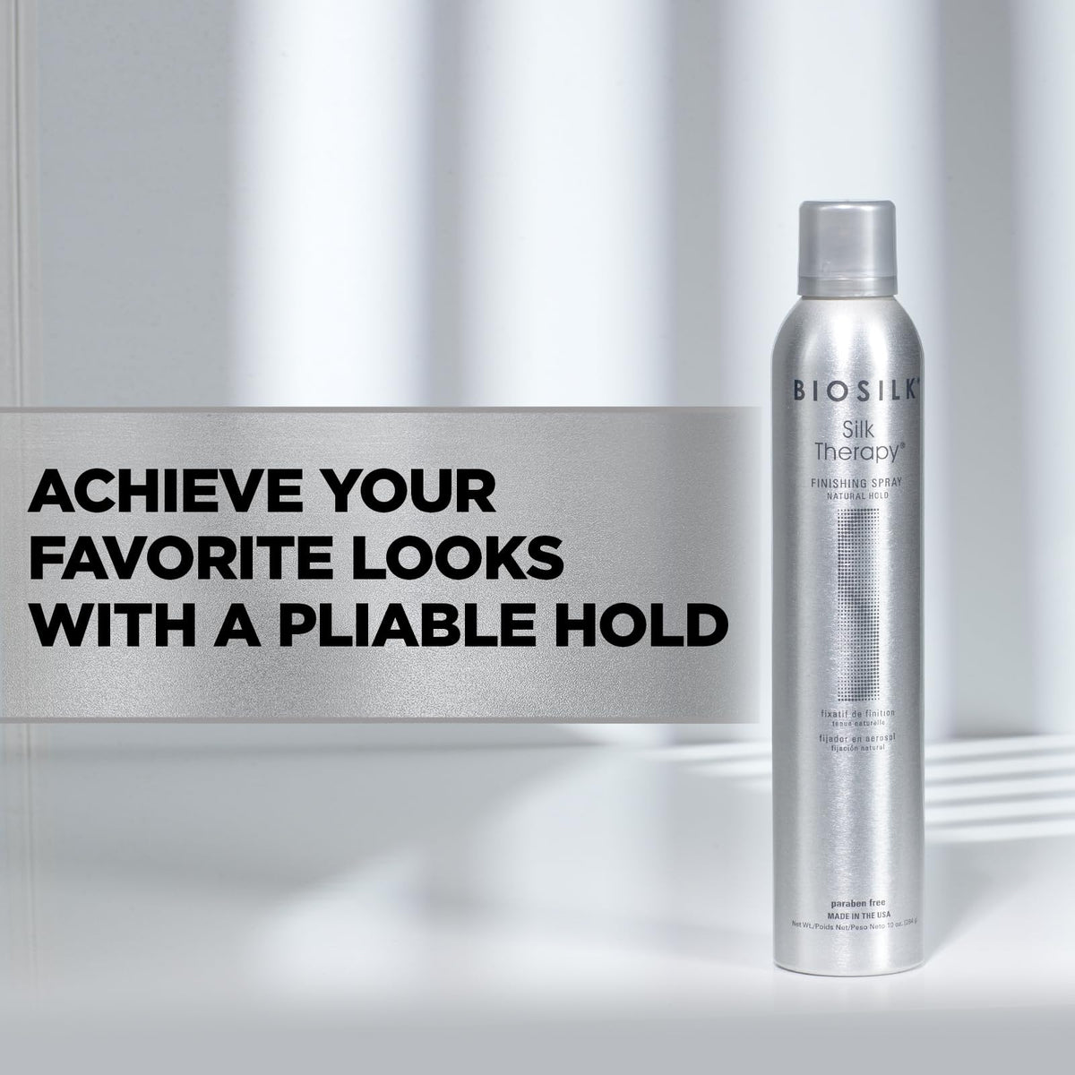 BioSilk 10 oz bottle in hand to illustrate true size and portability