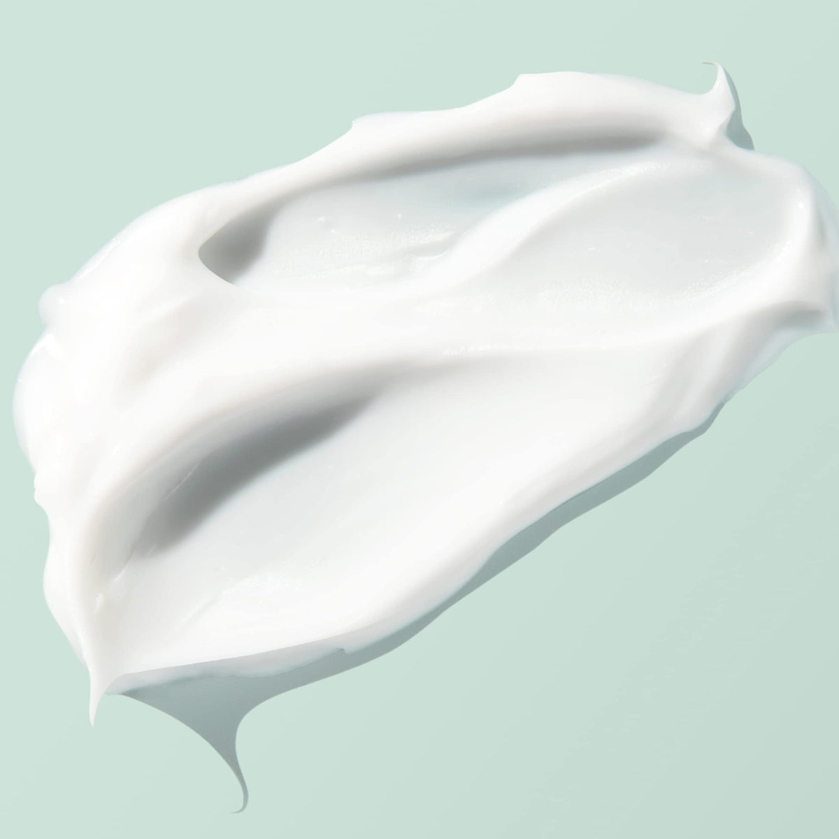 BIOSSANCE application on face lifestyle image showing smooth, hydrated finish