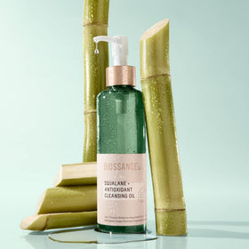 Biossance cleansing oil label closeup showing key ingredients like squalane and antioxidants for skin-support benefit
