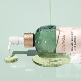 BIOSSANCE held in hand for size comparison illustrating travel-friendly convenience