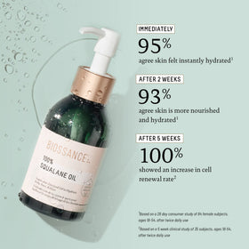 BIOSSANCE smoothing oil through damp hair to reduce frizz and add shine