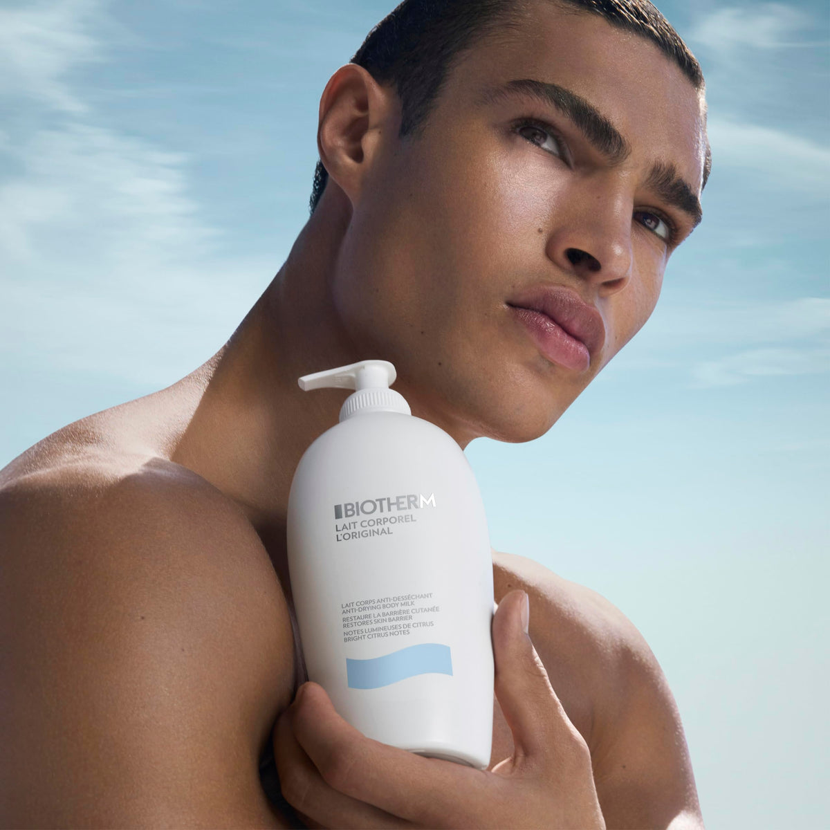 Biotherm Lait Corporel with citrus fruits to suggest fresh scent benefit