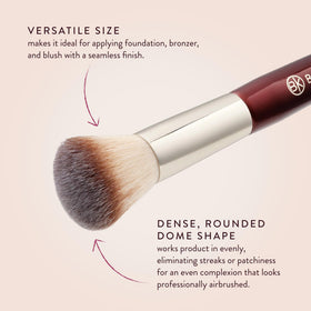 BK BEAUTY brush in hand applying foundation for quick even coverage
