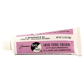 Black and White cream texture close-up demonstrating smooth blendability and coverage