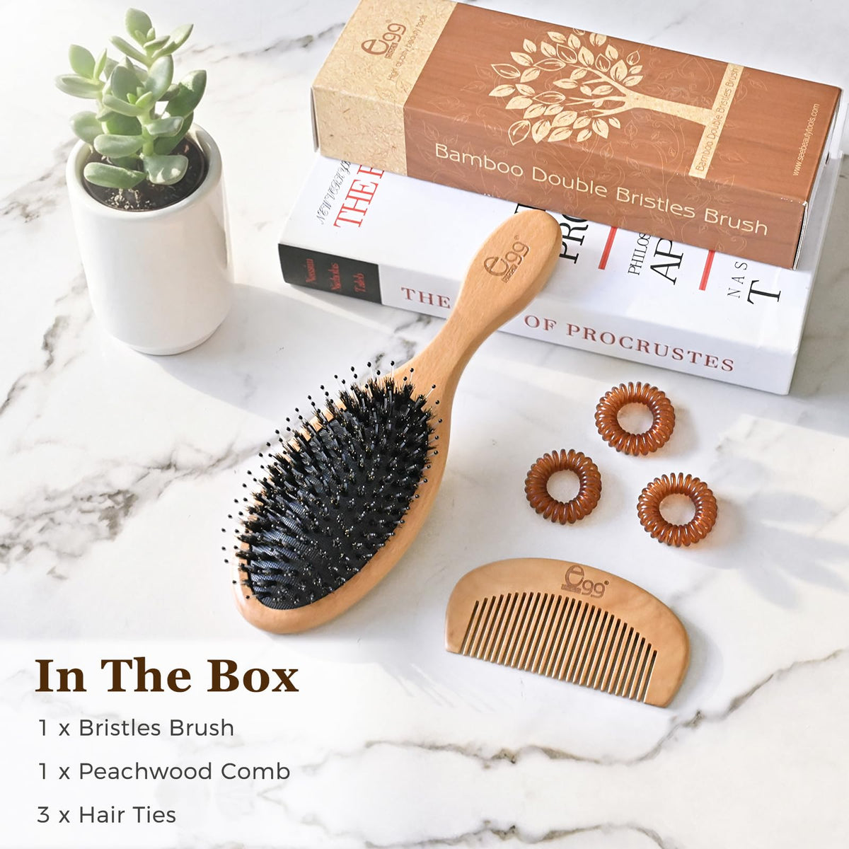 BLACK EGG brush back view showing cushioned pad for gentle pressure distribution
