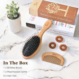 BLACK EGG brush back view showing cushioned pad for gentle pressure distribution