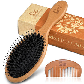 BLACK EGG paddle brush front view showing bristles and cushion for smoother hair