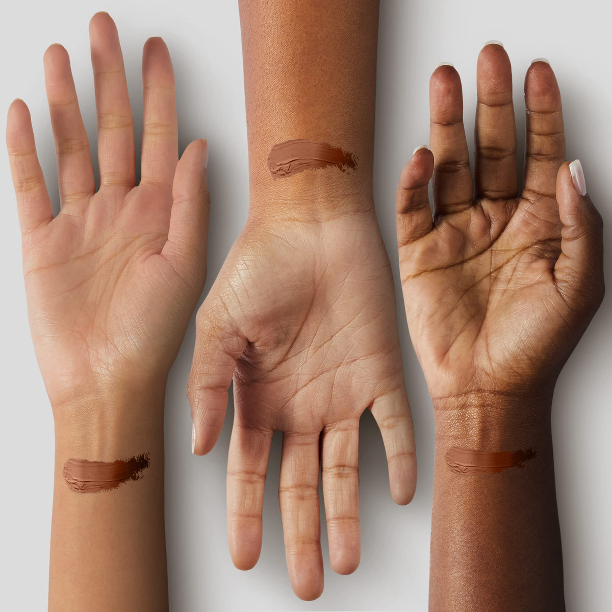 Black Radiance applying stick to cheek for sculpting and coverage