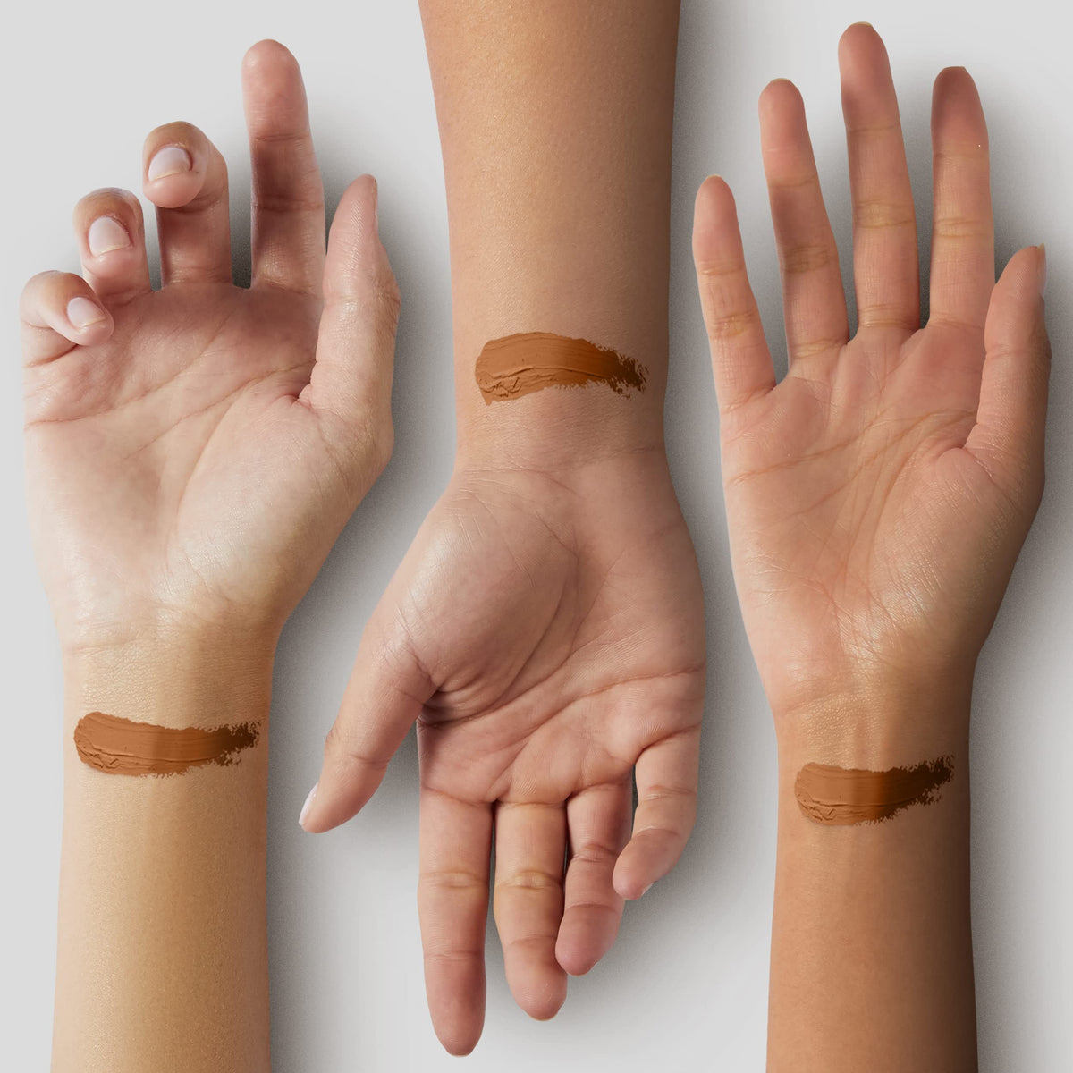 Black Radiance stick held in hand showing scale and travel-friendly benefit