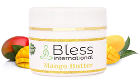 Bless International spoon with mango butter close-up showing smooth spreadability