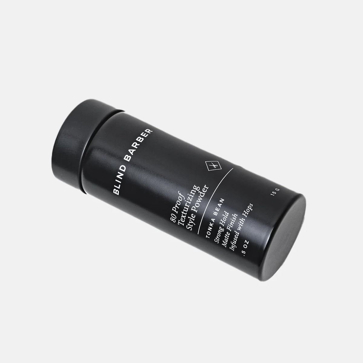 Blind Barber powder in hand demonstrating small dose and easy control
